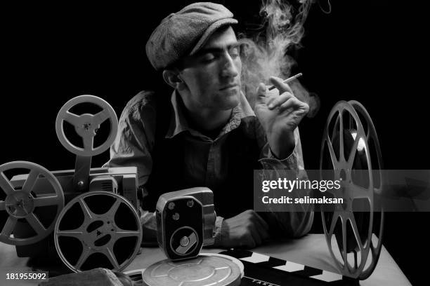old fashioned cinema director - film projector stock pictures, royalty-free photos & images