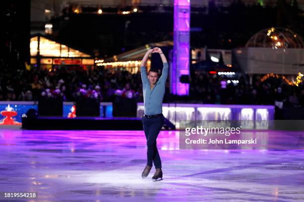 Ryan Bradley skates during the 2023 Bryant Park tree lighting ceremony on November 28, 2023 in New York City.