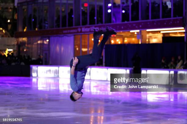 Ryan Bradley skates during the 2023 Bryant Park tree lighting ceremony on November 28, 2023 in New York City.