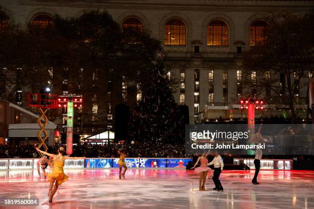 Ice Theater of New York skaters perform during the 2023 Bryant Park tree lighting ceremony on November 28, 2023 in New York City.