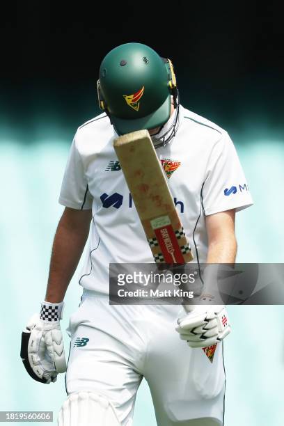 Bradley Hope of the Tigers walks from the field after being dismissed during the Sheffield Shield match between New South Wales and Tasmania at SCG,...