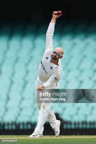 Nathan Lyon of New South Wales bowls during the Sheffield Shield match between New South Wales and Tasmania at SCG, on November 29 in Sydney,...