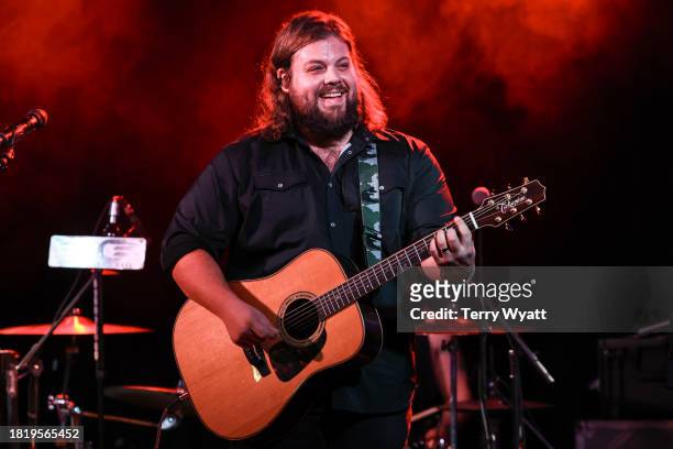Dillon Carmichael performs on stage at 3rd & Lindsley on November 28, 2023 in Nashville, Tennessee.