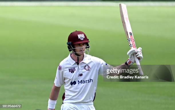 Jack Clayton of Queensland celebrates after scoring a half century during day two of the Sheffield Shield match between Queensland and Western...