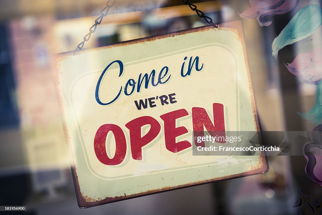 Business Opening with Open Sign