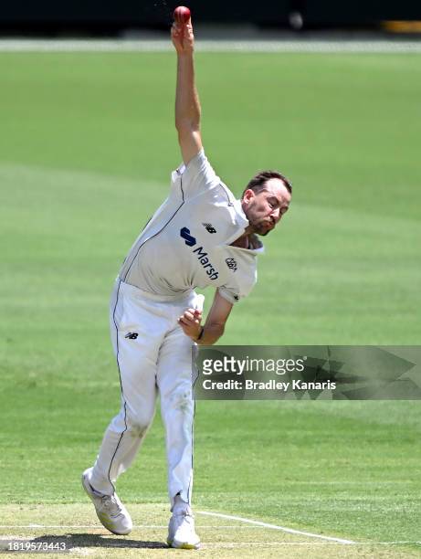 Charlie Stobo of Western Australia bowls during day two of the Sheffield Shield match between Queensland and Western Australia at The Gabba, on...