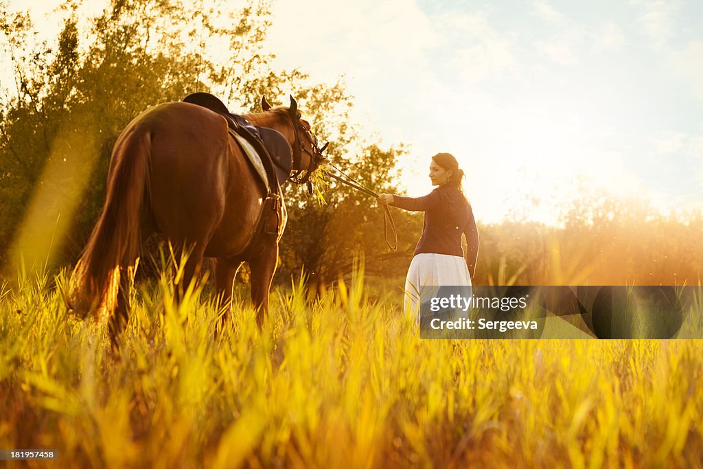 Beautiful woman and  horse
