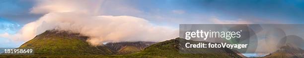 mist covered mountains panorama isle of skye scotland - silentfoto heather stock pictures, royalty-free photos & images