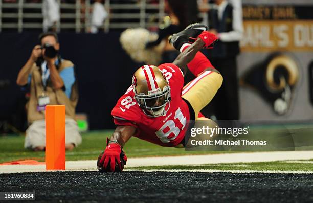 Anquan Boldin of the San Francisco 49ers scores a touchdown against the St. Louis Rams at the Edward Jones Dome on September 26, 2013 in St. Louis,...