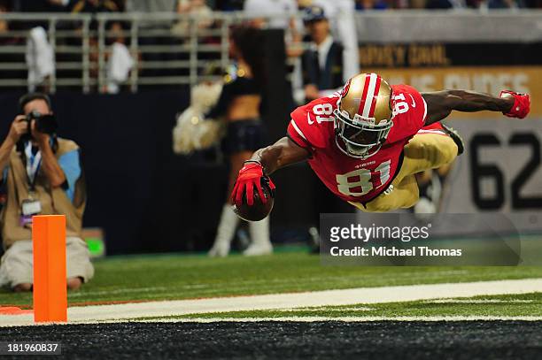Anquan Boldin of the San Francisco 49ers scores a touchdown against the St. Louis Rams at the Edward Jones Dome on September 26, 2013 in St. Louis,...