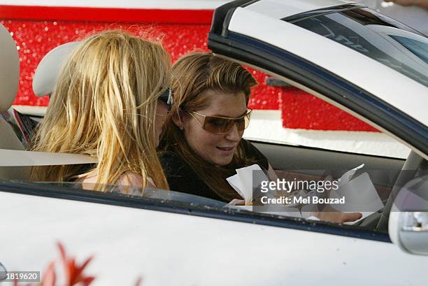Musician Britney Spears and friend drive through In-N-Out Burger on February 27, 2003 in Hollywood, California.