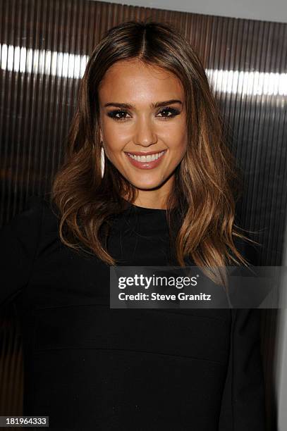 Actress Jessica Alba arrives at the "A.C.O.D." premiere at the Landmark Theater on September 26, 2013 in Los Angeles, California.