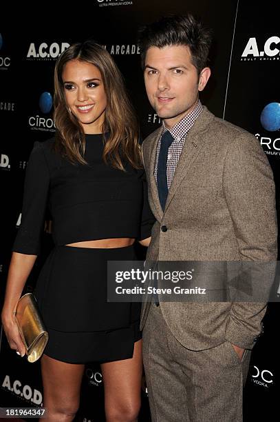 Actors Jessica Alba and Adam Scott arrive at the "A.C.O.D." premiere at the Landmark Theater on September 26, 2013 in Los Angeles, California.