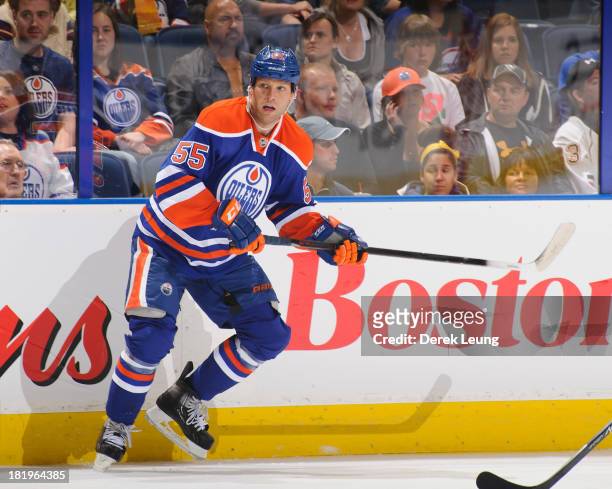 Ben Eager of the Edmonton Oilers skates against the Winnipeg Jets during a preseason NHL game at Rexall Place on September 23, 2013 in Edmonton,...