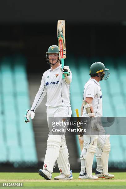 Mitchell Owen of the Tigers celebrates after scoring a half century during the Sheffield Shield match between New South Wales and Tasmania at SCG, on...