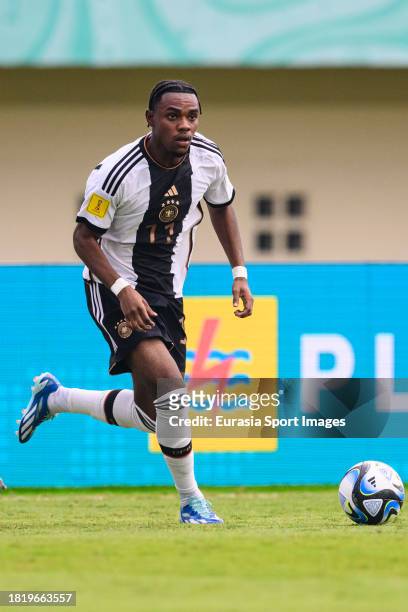 Charles Herrmann of Germany runs with the ball during FIFA U-17 World Cup Round of 16 match between Germany and USA at Si Jalak Harupat Stadium on...