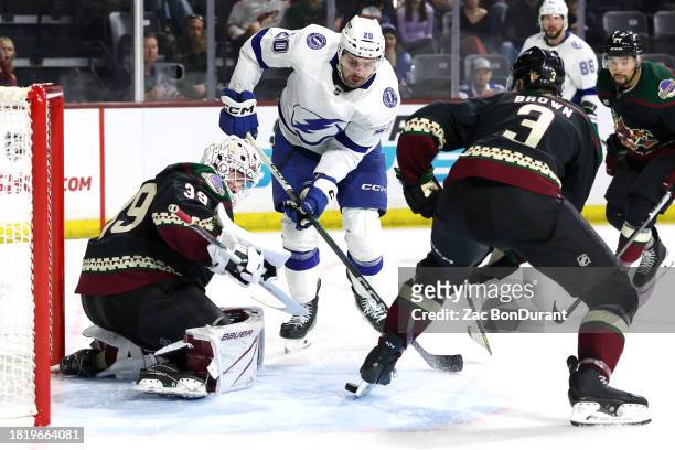 Nicholas Paul of the Tampa Bay Lightning takes a shot against Connor Ingram of the Arizona Coyotes during the third period at Mullett Arena on...