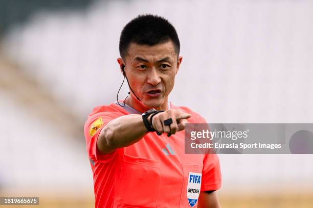 Referee Ming Fu gestures during FIFA U-17 World Cup Round of 16 match between Germany and USA at Si Jalak Harupat Stadium on November 21, 2023 in...
