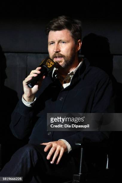 Andrew Haigh speaks onstage during the "All of Us Strangers" BAFTA screening at AMC Lincoln Square Theater on November 28, 2023 in New York City.