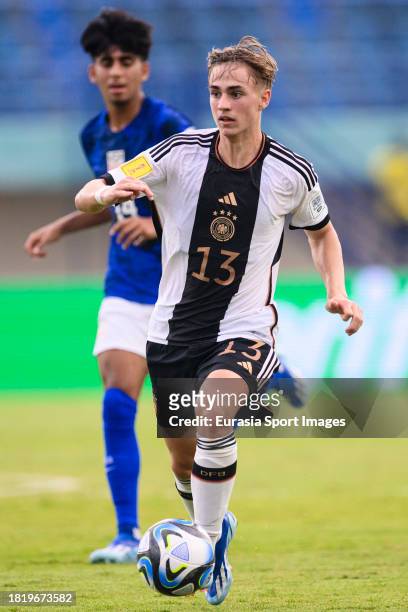 Maximilian Hennig of Germany runs with the ball during FIFA U-17 World Cup Round of 16 match between Germany and USA at Si Jalak Harupat Stadium on...