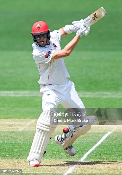 Liam Scott of the Redbacks bats during the Sheffield Shield match between South Australia and Victoria at Adelaide Oval, on November 29 in Adelaide,...