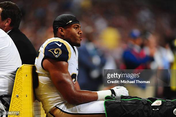 McDonald of the St. Louis Rams is carted off the field after suffering a knee injury during a game against the San Francisco 49ers at the Edward...