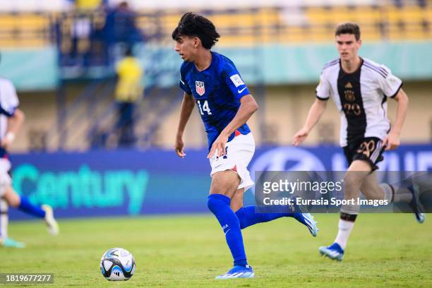 Taha Habroune of United States runs with the ball during FIFA U-17 World Cup Round of 16 match between Germany and USA at Si Jalak Harupat Stadium on...