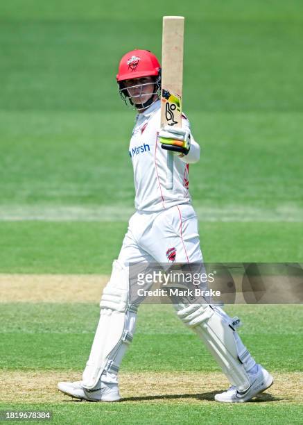 Jake Fraser-McGurk of the Redbacks celebrates making his half century during the Sheffield Shield match between South Australia and Victoria at...