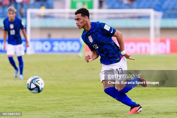 Peyton Miller of United States runs with the ball during FIFA U-17 World Cup Round of 16 match between Germany and USA at Si Jalak Harupat Stadium on...
