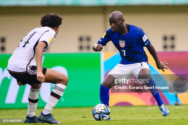 Nimfasha Berchimas of United States plays against David Odogu of Germany during FIFA U-17 World Cup Round of 16 match between Germany and USA at Si...