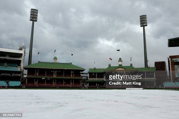 The covers are seen on the pitchduring the Sheffield Shield match between New South Wales and Tasmania at SCG, on November 29 in Sydney, Australia.