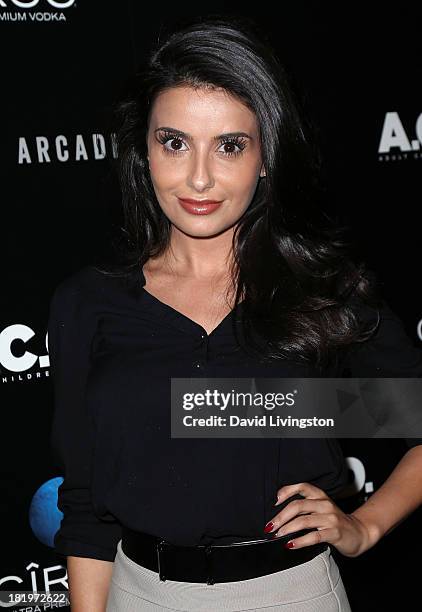 Actress Mikaela Hoover attends the premiere of the Film Arcade's "A.C.O.D." at the Landmark Theater on September 26, 2013 in Los Angeles, California.