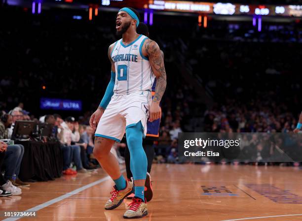 Miles Bridges of the Charlotte Hornets celebrates his three point shot during the second half of an NBA In-Season Tournament game against the New...