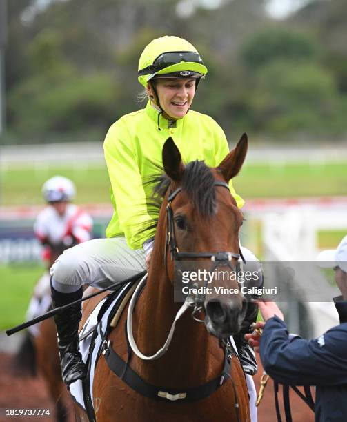 Celine Gaudray riding South of Houston after winning Race 7, the Thoroughbred Club Australia Handicap, during Melbourne Racing at Sandown Lakeside on...
