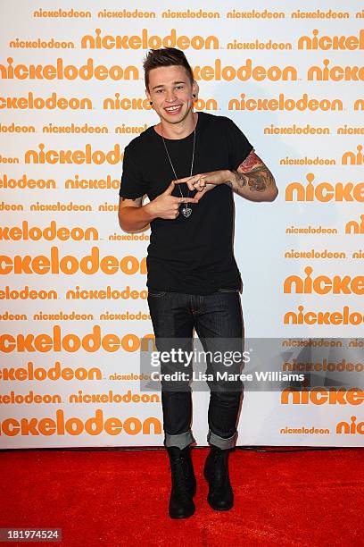 Reece Mastin poses on the media wall ahead of the Nickelodeon Slimefest 2013 evening show at Sydney Olympic Park Sports Centre on September 27, 2013...