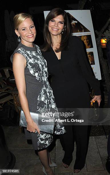 Actress Elizabeth Banks and actress Jeanne Tripplehorn attend C Magazine Dinner And Reception Celebrating Leland Orser's "Morning" held at Chateau...