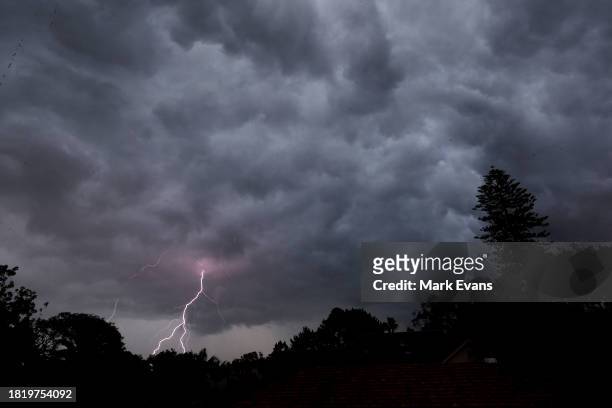 Lightning strikes on November 29, 2023 in Sydney, Australia. The storm front will move from the south to the eastern half of the New South Wales...