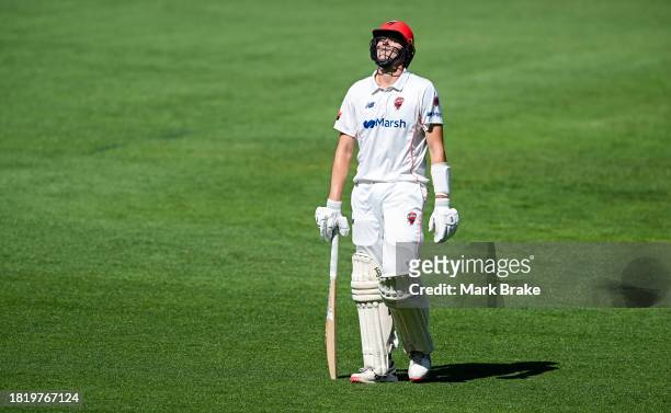 Liam Scott of the Redbacks leaves the ground after getting out to Doug Warren of the Bushrangers during the Sheffield Shield match between South...