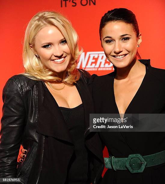 Actresses Emily Osment and Emmanuelle Chriqui attend the "Cleaners" digital series premiere at Cary Grant Theater on September 26, 2013 in Culver...