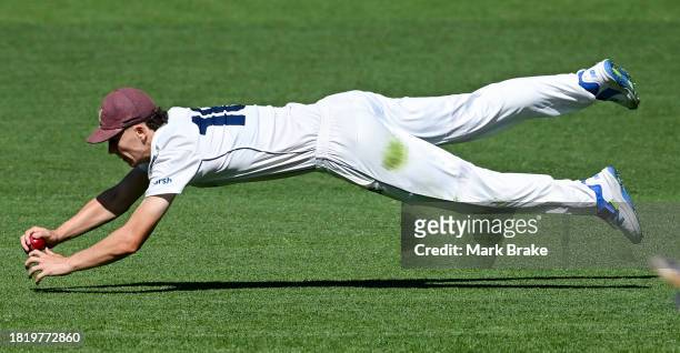 Mitchell Perry of the Bushrangers fields during the Sheffield Shield match between South Australia and Victoria at Adelaide Oval, on November 29 in...