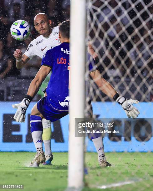 Fabio Santos of fights for the ball with goalkeeper Leo Jardim of Vasco during the match between Vasco Da Gama and Corinthians as part of Brasileirao...