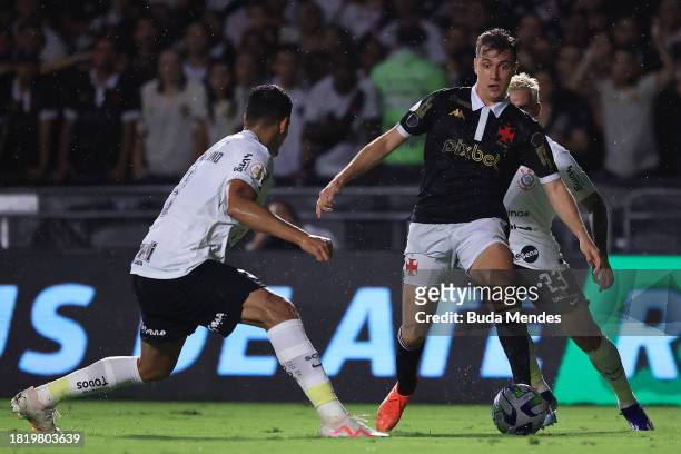Lucas Piton of Vasco fights for the ball with Fagner of Corinthians during the match between Vasco Da Gama and Corinthians as part of Brasileirao...