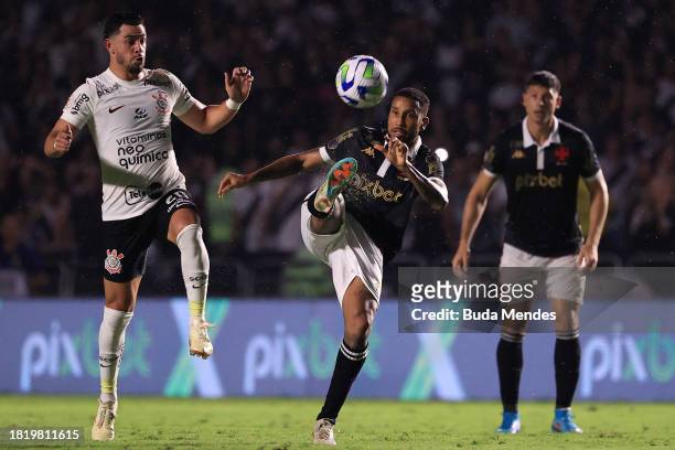 Jair of Vasco fights for the ball with Guiliano of Corinthians during the match between Vasco Da Gama and Corinthians as part of Brasileirao 2023 at...
