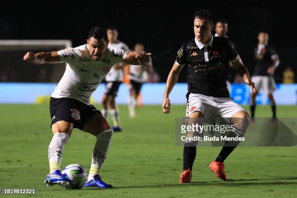 Guiliano of Corinthians fights for the ball with Manuel Capasso of Vasco during the match between Vasco Da Gama and Corinthians as part of...