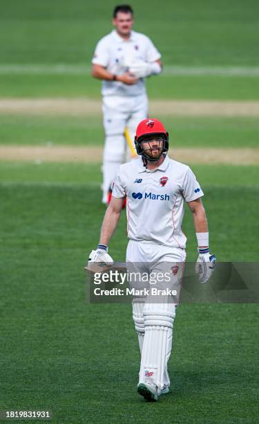 Nathan McAndrew of the Redbacks leaves the ground after getting out to Fergus O'Neill of the Bushrangers during the Sheffield Shield match between...