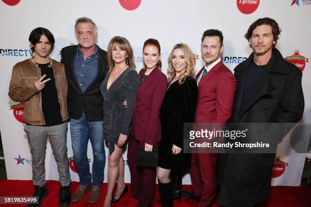 Max Ehrich, Bruce Thomas, Mary-Margaret Humes, Sarah Drew, Autumn Federici, Jake Helgren and Adam Senn attend a Holiday Celebration with the Stars of...