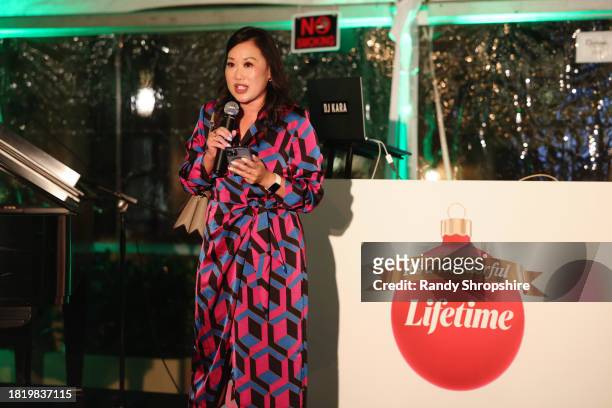 Kannie Yu Lapack, SVP of Public Affairs at Lifetime, LMN and A+E Networks speaks onstage during a Holiday Celebration with the Stars of "It's A...