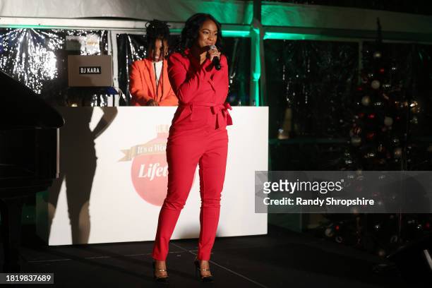 Tatyana Ali performs onstage during a Holiday Celebration with the Stars of "It's A Wonderful Lifetime", joining together to honor military spouses...