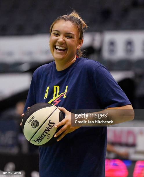 Ella Batish of the Lightning warms up before the start of the WNBL match between Townsville Fire and Adelaide Lightning at Townsville Entertainment...
