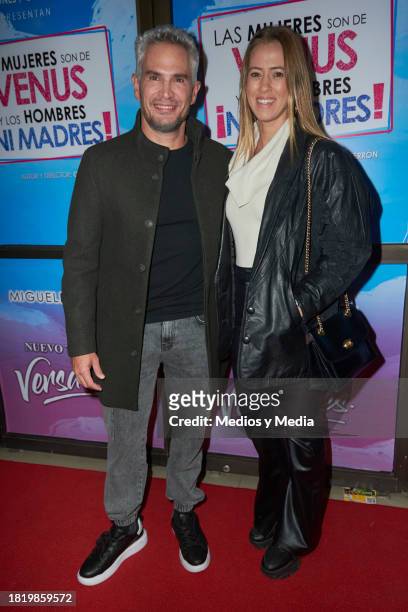 Julio Camejo and Isabela Gutman pose for a photo on the red carpet for the play "Las Mujeres son de Venus" at Nuevo Teatro Versalles on November 28,...